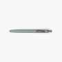 Grauer Uniball Zento Gelstift mit 0,38 mm Spitze, weichem Gummigriff und gefedertem Metallclip auf weißem Hintergrund.